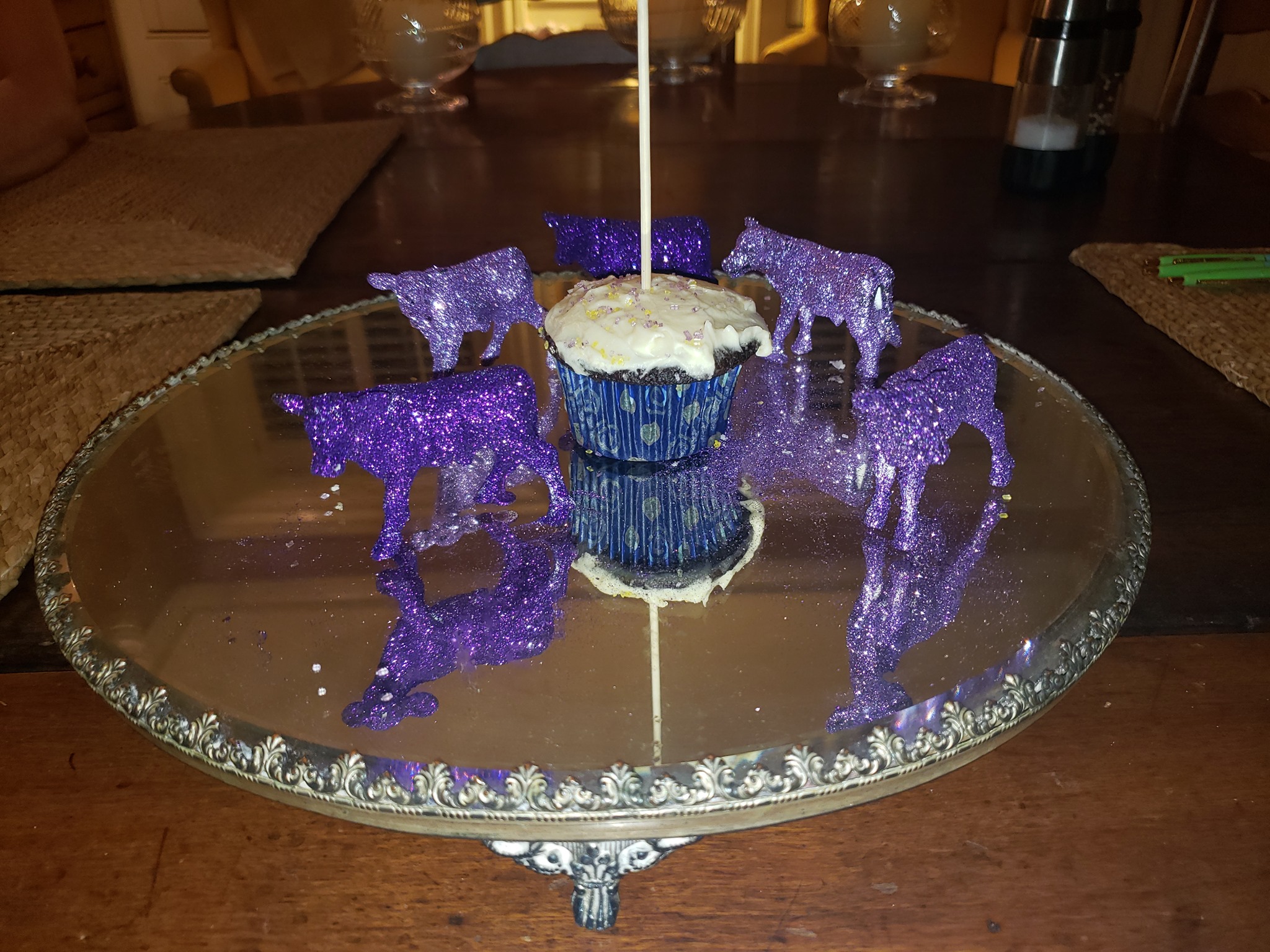 small cow figurines on top of a table