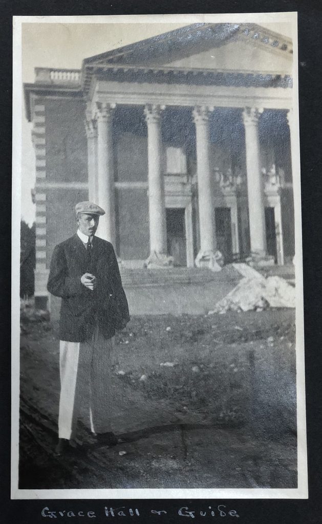 e kendall gillett scrapbook 16 A black and white photograph of E. K. Gillett in front of Grace Hall construction (now Chapin Hall).