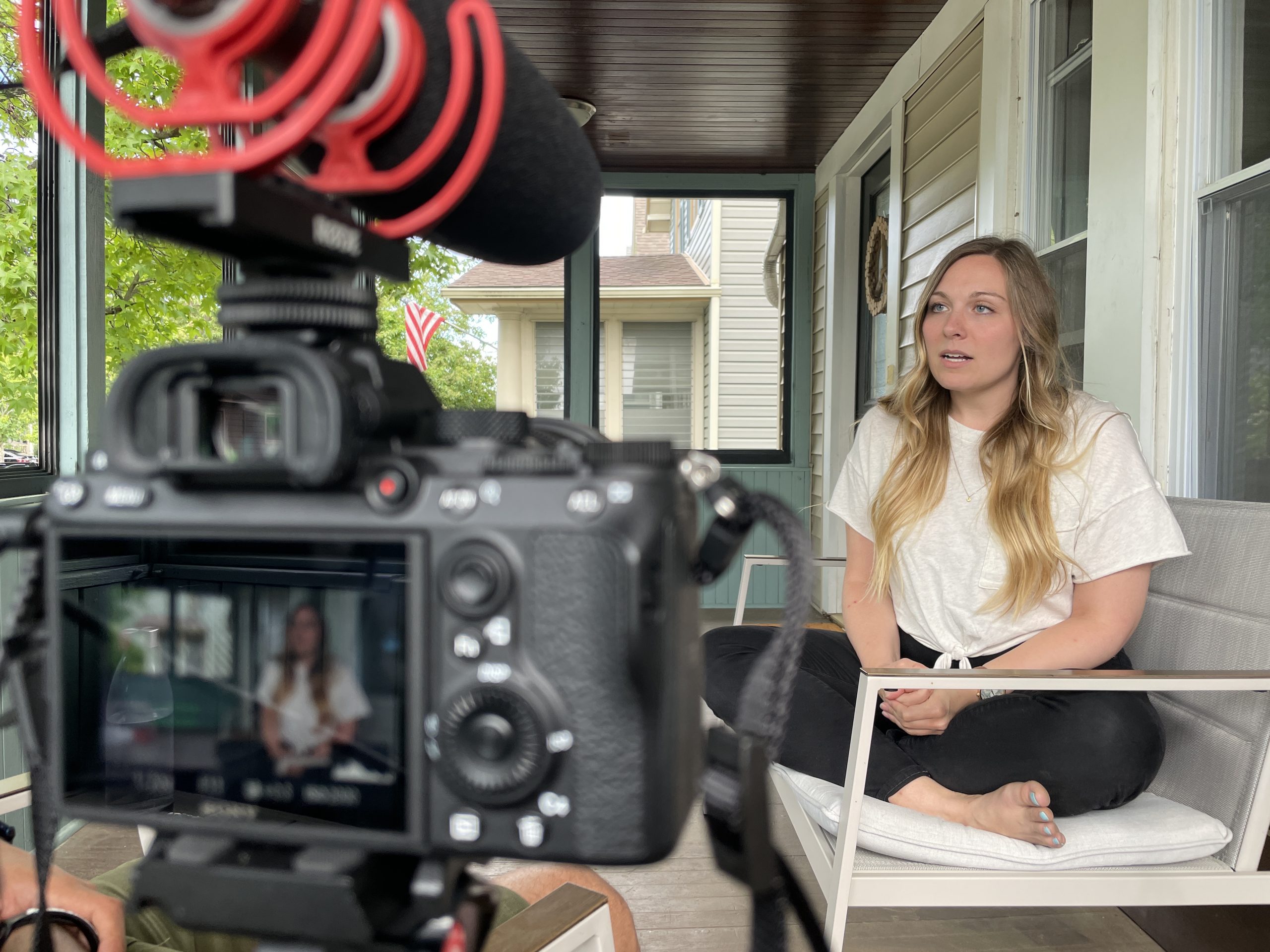 alex-interviewshot Alex sitting down for an interview in her porch.