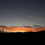 An orange and pink mountain sunset.