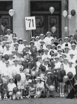 B&W photo of people gathered toegther