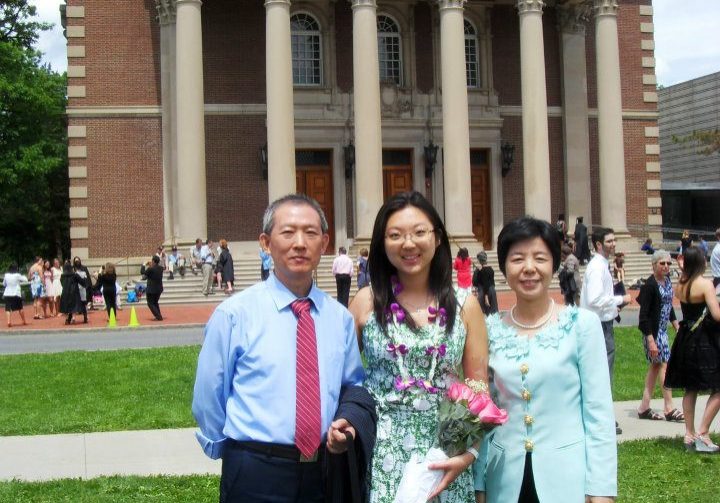 Pinsi Lei 4 Pinsi standing with parents in front of Chapin Hall