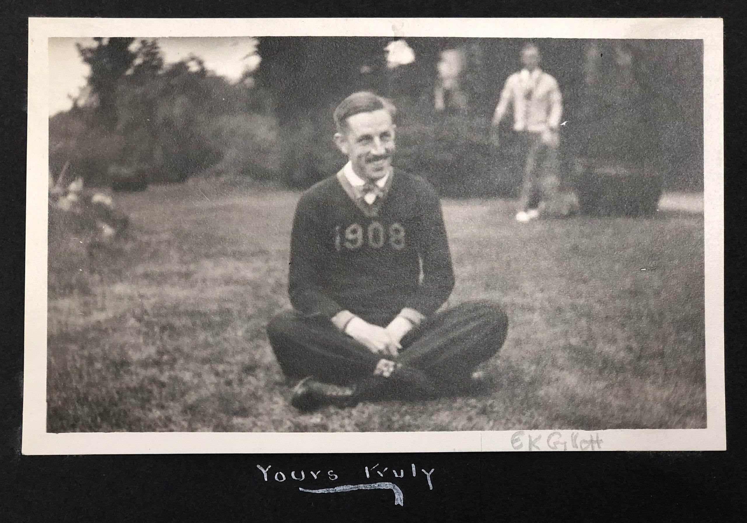 e kendall gillett scrapbook 07 An archival black-and-white photography of E. Kendall Gillet, who wears a sweater with the year 1908 across the chest.